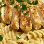 Are you in search of a delectable dish that perfectly combines convenience, flavor, and comfort? Look no further than Creamy Garlic Butter Chicken & Rotini in Parmesan Sauce! This delightful recipe strikes the perfect balance between creamy textures and robust flavors, making it an ideal choice for family dinners and special occasions alike. Imagine tender pieces of chicken enveloped in a luscious garlic butter sauce, paired with al dente rotini pasta and a sprinkle of Parmesan cheese—it's a dish that promises to impress even the pickiest of eaters.