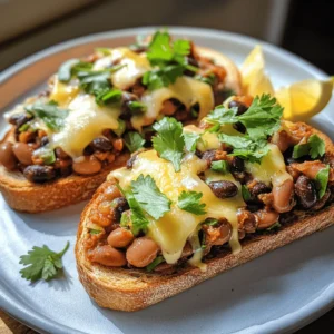 If you're looking for a dish that brings comfort and a kick of flavor, look no further than Cheesy Masala Beans on Toast. This delightful meal marries the rich traditions of Indian cuisine with the simplicity of a classic toast, resulting in a dish that is satisfying and packed with taste. The fusion of hearty beans simmered in aromatic spices and topped with gooey cheese creates a tantalizing experience that is perfect for any time of day.