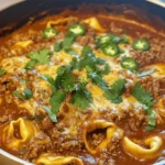 If you're on the lookout for a dish that beautifully marries the rich, savory flavors of Mexican cuisine with the comforting embrace of Italian pasta, look no further than Cheesy Beef Enchilada Tortellini. This delightful recipe is a fusion masterpiece that combines the tender, cheesy goodness of tortellini with the bold, zesty essence of enchiladas—creating a satisfying meal that is perfect for busy weeknights or festive gatherings.